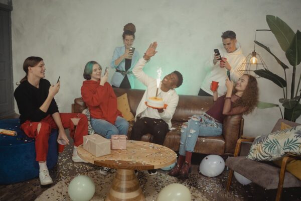 a group of friends celebreting one's birthday
