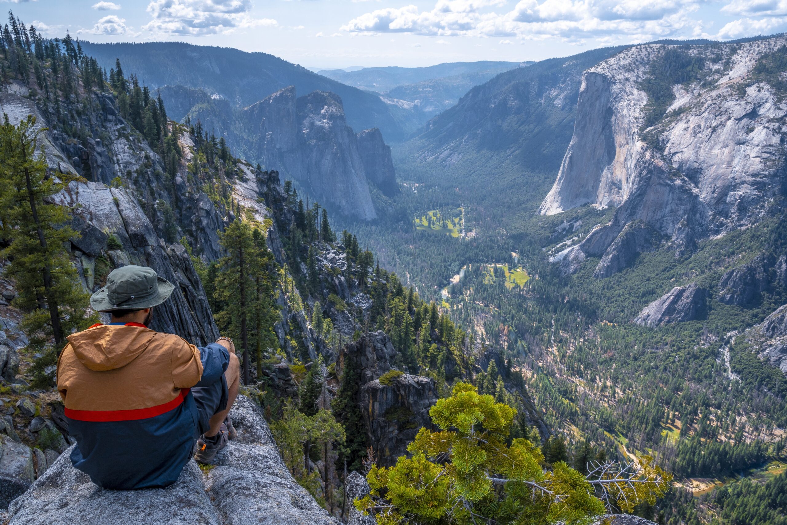 man-sitting-rock-yosemite-national-park-sentinel-dome-yosemite-usa